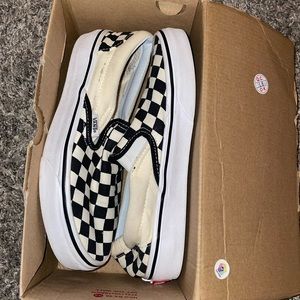 Slip on checkerboard vans